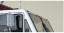 Truck cab without exterior sun visor